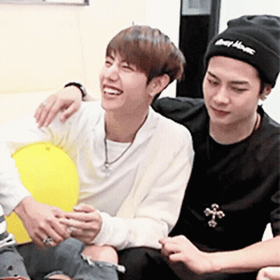 Two Men Sitting On Couch Laughing GIF