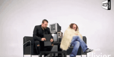 Two Men Sitting On Couch Made With Flivier GIF
