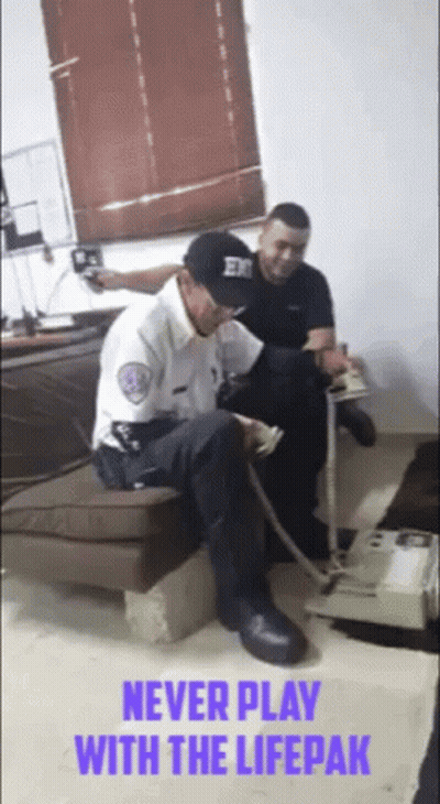 Two Men Sitting On Couch Saying Never Play With Lifepak GIF