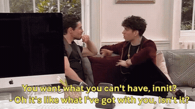 Two Men Sitting On Couch Saying You Want What You Can't Have GIF