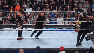 Two Men Sitting On Couch Talking GIF