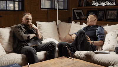 Two Men Sitting On Couch GIF