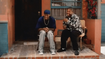 Two Men Sitting On Porch Talking GIF