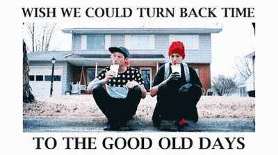 Two Men Sitting On The Side Of The Road With The Words Wish We Could Turn Back Time To The Good Old Days Above Them GIF