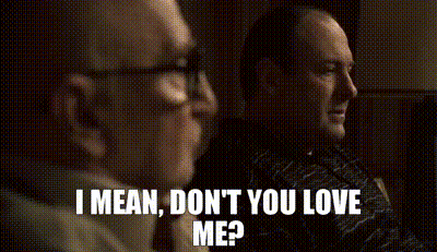 Two Men Sitting One Asking If He Loves Him GIF
