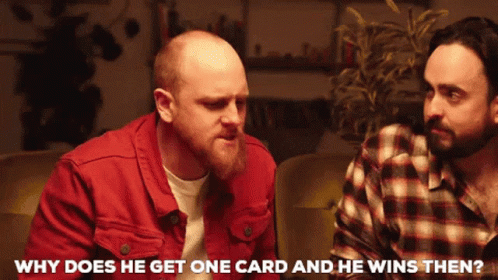 Two Men Sitting, One Asking Why Does He Get One Card And He Wins Then GIF