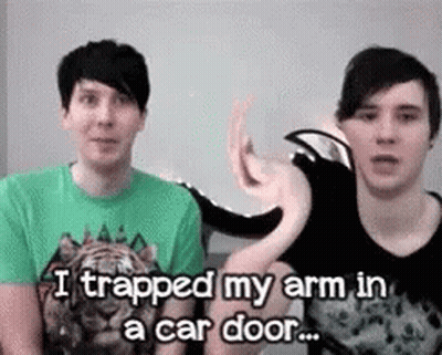 Two Men Sitting One Says I Trapped My Arm in a Car Door