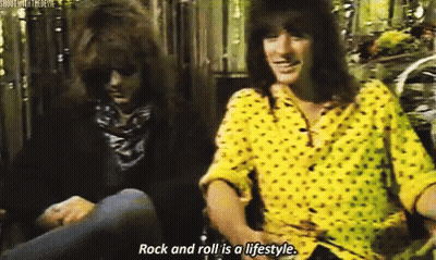 Two Men Sitting Saying Rock and Roll Is a Lifestyle
