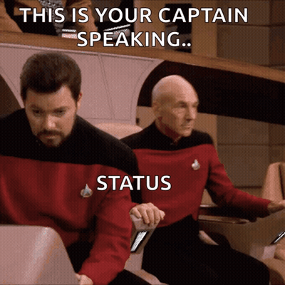 Two Men Sitting This Is Your Captain Speaking Status GIF