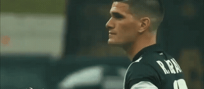 Two Men Sitting Together GIF