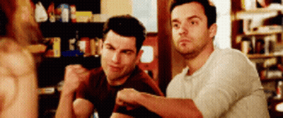 Two Men Sitting With Crossed Arms GIF