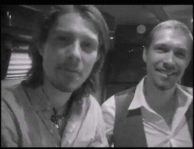 Two Men Smiling Black And White Photo GIF