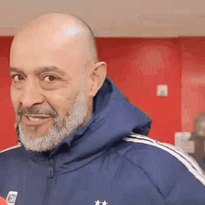 Two Men Smiling For A Picture GIF