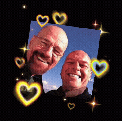 Two Men Smiling In A Cube GIF