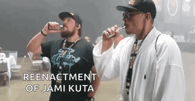 Two Men Smoking E-Cigarettes Reenactment Of Jami Kuta GIF
