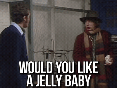 Two Men Standing And Talking GIF