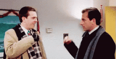 Two Men Standing And Talking GIF