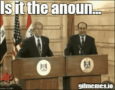 Two Men Standing At Podiums With A Caption That Says Is It The Anoun GIF
