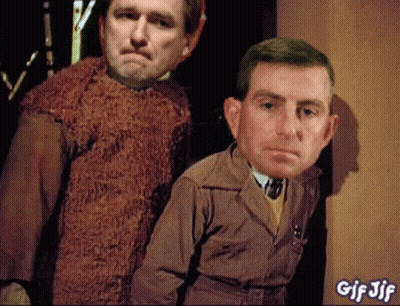 Two Men Standing Beside Each Other GIF