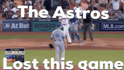 Two Men Standing Braves And Astros Shirts GIF