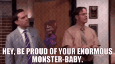 Two Men Standing In A Room GIF