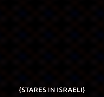 Two Men Standing In A Room One Talking About Israel GIF