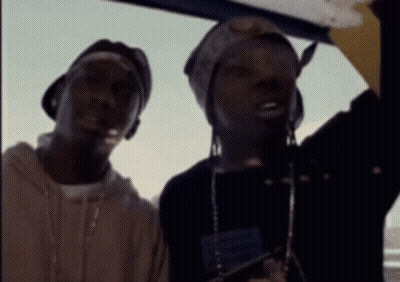 Two Men Standing In Car GIF
