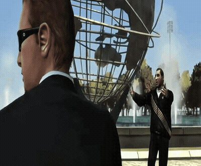 Two Men Standing In Front Of A Large Globe GIF