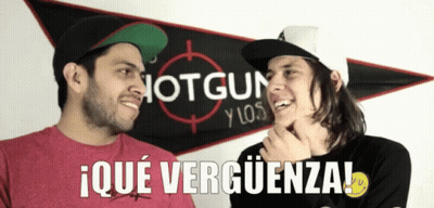 Two Men Standing In Front Of A Sign That Says Shotgun Y Los GIF