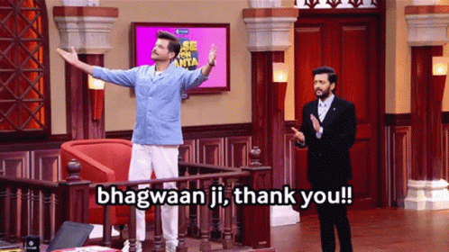 Two Men Standing In Front Of Bhagwaan Ji Thank You Sign GIF