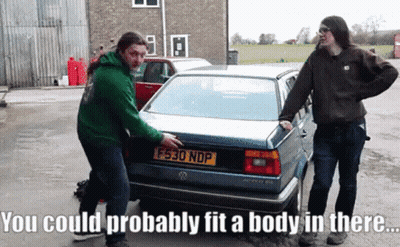 Two Men Standing In Front Of Car With License Plate F530 NDP GIF