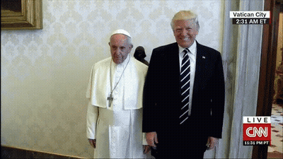 Two Men Standing In Front Of CNN Live Wall GIF