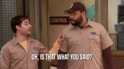 Two Men Standing In Front Of Control Door GIF