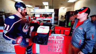 Two Men Standing In Front Of Pizza Box GIF
