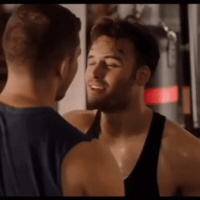 Two Men Standing In Gym GIF