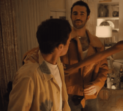 Two Men Standing In Living Room GIF