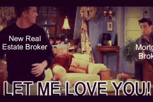 Two Men Standing In Living Room With Let Me Love You GIF