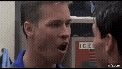 Two Men Standing In Locker Room GIF
