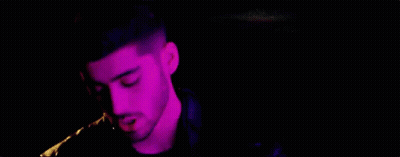 Two Men Standing In Purple Light GIF