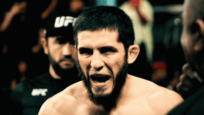 Two Men Standing In The Dark GIF