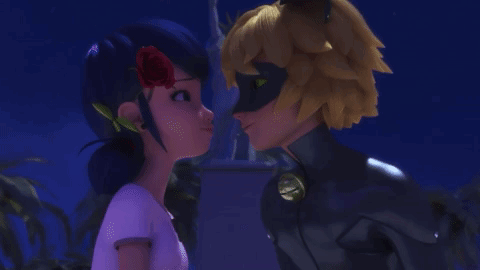 Two Men Standing Next To Each Other GIF