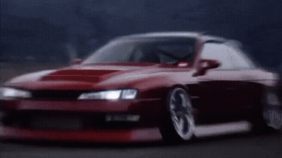 Two Men Standing Next To Each Other GIF