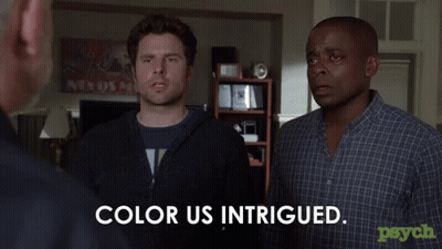 Two Men Standing Next To Each Other Color Us Intrigued GIF