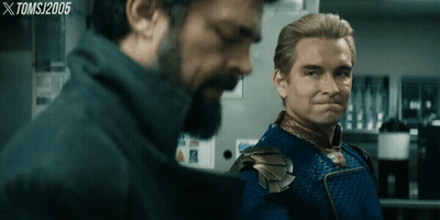 Two Men Standing Next To Each Other GIF