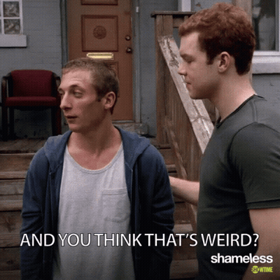 Two Men Standing Next To Each Other GIF
