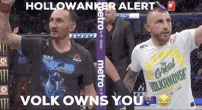 Two Men Standing Next To Each Other Hollowanker Alert GIF