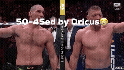 Two Men Standing Next To Each Other GIF
