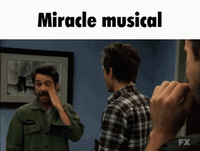 Two Men Standing Next To Each Other Miracle Musical GIF