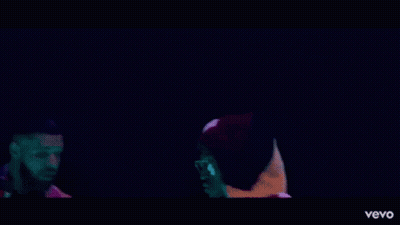 Two Men Standing Next To Each Other GIF