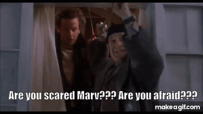 Two Men Standing Next To Each Other One Asking If Scared GIF